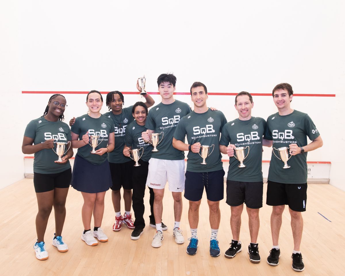 SquashBusters team with trophies